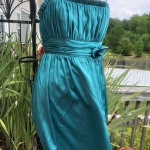 Knee length dress by Alfred Angelo